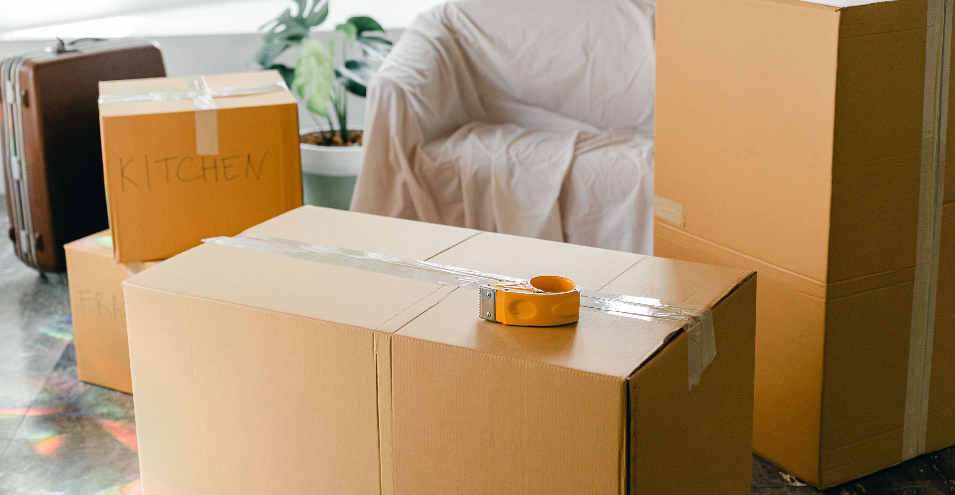 Packed moving boxes in a home ready for moving day